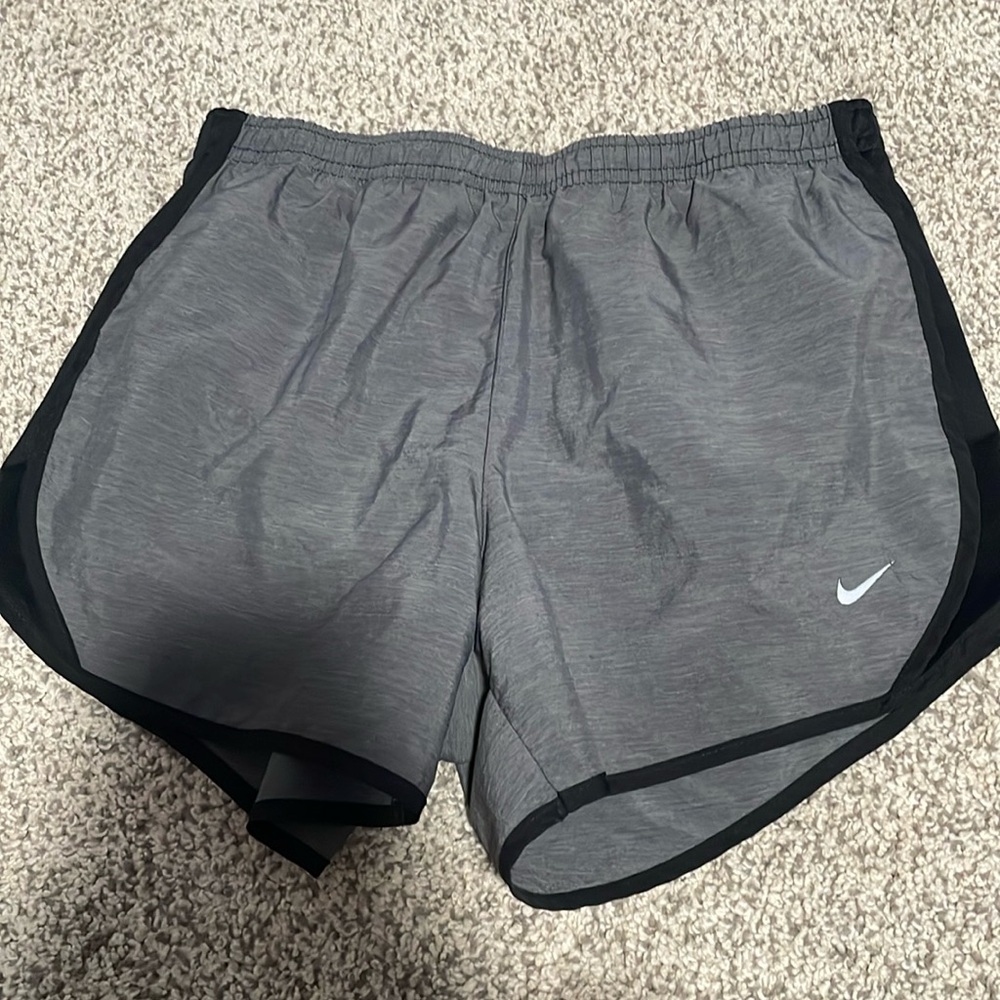 Grey Nike athletic shorts size large in youth